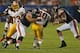 CHICAGO, IL - AUGUST 18: Robert Griffin III #10 of the Washington Redskins is sacked by Matt Toeaina #75 and Israel Idonije #71 of the Chicago Bears during a preseason game at Soldier Field on August 18, 2012 in Chicago, Illinois. (Photo by Jonathan Daniel/Getty Images)