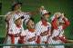 SOUTH WILLIAMSPORT, PA - AUGUST 28: Members of the Japan team from Hamamatsu City, Japan cheer on their team from the dugout against the West team from Huntington Beach, California during the Little League World Series championship game on August 28, 2011 in South Williamsport, Pennsylvania. The West team defeated the team from Japan 2-1. (Photo by Rob Carr/Getty Images)
