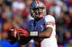 JACKSONVILLE, FL - JANUARY 02: Quaterback Braxton Miller #5 of Ohio State Buckeyes looks to pass during the first half at the TaxSlayer.com Gator Bowl against the Florida Gators at EverBank Field on January 2, 2012 in Jacksonville, Florida. (Photo by Scott Halleran/Getty Images)