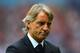 MANCHESTER, ENGLAND - AUGUST 19: Manchester City Manager Roberto Mancini looks on prior to the Barclays Premier League match between Manchester City and Southampton at Etihad Stadium on August 19, 2012 in Manchester, England. (Photo by Shaun Botterill/Getty Images)