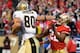 SAN FRANCISCO, CA - JANUARY 14: Jimmy Graham #80 of New Orleans Saints pushes away from Carlos Rogers #22 of the San Francisco 49ers and goes 66 yards for a touchdown in the fourth quarter during the NFC Divisional playoff game at Candlestick Park on January 14, 2012 in San Francisco, California. (Photo by Thearon W. Henderson/Getty Images)