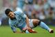 MANCHESTER, ENGLAND - AUGUST 19: Sergio Aguero of Manchester City grimaces in pain after sustaining an injury during the Barclays Premier League match between Manchester City and Southampton at Etihad Stadium on August 19, 2012 in Manchester, England. (Photo by Michael Regan/Getty Images)