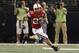 Dec 4, 2010; Arlington, TX, USA; Nebraska Cornhuskers running back Rex Burkhead (22) runs the ball against the Oklahoma Sooners in the second quarter of the 2010 Big 12 championship game at Cowboys Stadium. Mandatory Credit: Brett Davis-US PRESSWIRE