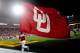Dec. 30, 2011; Tempe, AZ, USA; An Oklahoma Sooners flag is waived after the team scored a touchdown during the second half against the Iowa Hawkeyes during the 2011 Insight Bowl at Sun Devil Stadium. Mandatory Credit: Matt Kartozian-US PRESSWIRE