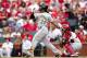 ST. LOUIS, MO - AUGUST 18: Andrew McCutchen #22 of the Pittsburgh Pirates follows through his swing during the game against the St. Louis Cardinals at Busch Stadium on August 18, 2012 in St. Louis, Missouri. (Photo by David Welker/Getty Images)