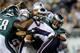 PHILADELPHIA, PA - NOVEMBER 27: Mike Patterson #98 of the Philadelphia Eagles makes a tackle against the New England Patriots at Lincoln Financial Field on November 27, 2011 in Philadelphia, Pennsylvania. (Photo by Patrick McDermott/Getty Images)