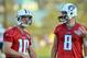 July 29, 2012; Nashville, TN, USA; Tennessee Titans quarterbacks Jake Locker (10) and Matt Hasselbeck (8) talk during training camp workout at the Titans training facility at Baptist Sports Park. Mandatory Credit: Jim Brown-US PRESSWIRE