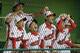 SOUTH WILLIAMSPORT, PA - AUGUST 28: Members of the Japan team from Hamamatsu City, Japan cheer on their team from the dugout against the West team from Huntington Beach, California during the Little League World Series championship game on August 28, 2011 in South Williamsport, Pennsylvania. The West team defeated the team from Japan 2-1. (Photo by Rob Carr/Getty Images)