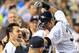 NEW YORK, NY - AUGUST 19: Ichiro Suzuki #31 of the New York Yankees (R) celebrates with his teammates after he connects on his second solo home run in the sixth inning against the Boston Red Sox at Yankees Stadium on August 19, 2012 in the Bronx borough of New York City. (Photo by Jason Szenes/Getty Images)
