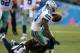 SAN DIEGO, CA - AUGUST 18: Wide receiver Dez Bryant #88 of the Dallas Cowboys is tacked by cornerback Quentin Jammer #23 of the San Diego Chargers at Qualcomm Stadium on August 18, 2012 in San Diego, California. (Photo by Stephen Dunn/Getty Images)