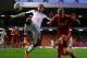 LIVERPOOL, ENGLAND - MAY 01: Martin Skrtel of Liverpool competes with Clint Dempsey of Fulham during the Barclays Premier League match between Liverpool and Fulham at Anfield on May 1, 2012 in Liverpool, England. (Photo by Clive Brunskill/Getty Images)