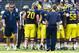 April 14, 2012; Ann Arbor, MI, USA; Michigan Wolverines head coach Brady Hoke walks back to set up the next series of plays during the Michigan spring game at Michigan Stadium. Mandatory Credit: Rick Osentoski-US PRESSWIRE