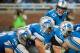 Aug 10, 2012; Detroit, MI, USA; Detroit Lions quarterback Kellen Moore (17) lines up behind the offensive linemen during the second half of a preseason game against the Cleveland Browns at Ford Field. Cleveland defeated Detroit 19-17. Mandatory Credit: Tim Fuller-US PRESSWIRE