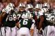 EAST RUTHERFORD, NJ - SEPTEMBER 11: (L-R) Offensive linemen D'Brickashaw Ferguson #60, Matt Slauson #68, Nick Mangold #74, Brandon Moore #65 and Wayne Hunter #78 of the New York Jets look towards quarterback Mark Sanchez in the huddle against the Dallas Cowboys during their NFL Season Opening Game at MetLife Stadium on September 11, 2011 in East Rutherford, New Jersey. (Photo by Jeff Zelevansky/Getty Images)