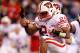 INDIANAPOLIS, IN - DECEMBER 03: Shelton Johnson #24 of the Wisconsin Badgers celebrates after he intercepted a pass in the first half against the Michigan State Spartans during the Big 10 Conference Championship Game at Lucas Oil Stadium on December 3, 2011 in Indianapolis, Indiana. (Photo by Gregory Shamus/Getty Images)
