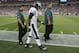 FOXBORO, MA - AUGUST 20: Michael Vick #7 of the Philadelphia Eagles leaves the field after he was hit on a play in the first quarter against the New England Patriots during a preseason game at Gillette Stadium on August 20, 2012 in Foxboro, Massachusetts. (Photo by Jim Rogash/Getty Images)