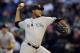 Aug 21, 2012; Chicago, IL, USA; New York Yankees starting pitcher Ivan Nova (47) throws a pitch against the Chicago White Sox in the first inning at US Cellular Field. Mandatory Credit: Mike DiNovo-US PRESSWIRE