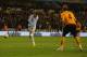 WOLVERHAMPTON, ENGLAND - OCTOBER 26: Adam Johnson (L) of Manchester scores his sides first goal during the Carling Cup Fourth Round match at Molineux on October 26, 2011 in Wolverhampton, England. (Photo by Michael Steele/Getty Images)