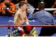 LAS VEGAS - MAY 02: Ricky Hatton of England kneels on the canvas as referee Kenny Bayless counts down after Hatton was knocked down by Manny Pacquiao of the Philippines during the first round of their junior welterweight title fight at the MGM Grand Garden Arena May 2, 2009 in Las Vegas, Nevada. Pacquiao defeated Hatton by a second round TKO. (Photo by Ethan Miller/Getty Images)