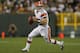 GREEN BAY, WI - AUGUST 16: Colt McCoy #12 of the Cleveland Browns drops back to pass against the Green Bay Packers during a preseason game at Lambeau Field on August 16, 2012 in Green Bay, Wisconsin. The Browns defeated the Packers 35-10. (Photo by Jonathan Daniel/Getty Images)