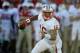 PASADENA, CA - JANUARY 02: Quarterback Russell Wilson #16 of the Wisconsin Badgers looks to pass the ball in the second quarter against the Oregon Ducks at the 98th Rose Bowl Game on January 2, 2012 in Pasadena, California. (Photo by Harry How/Getty Images)