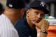 NEW YORK, NY - AUGUST 03: Alex Rodriguez #13 of the New York Yankees looks on from the bench during the game against the Seattle Mariners at Yankee Stadium on August 3, 2012 in the Bronx borough of New York City. Yankees defeated the Mariners 6-3. (Photo by Mike Stobe/Getty Images)