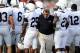 COLUMBUS, OH - NOVEMBER 13: Head Coach Joe Paterno of the Penn State Nittany Lions pushes his way through a group of his players during a timeout in a game against the Ohio State Buckeyes at Ohio Stadium on November 13, 2010 in Columbus, Ohio. (Photo by Jamie Sabau/Getty Images)
