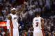 MIAMI, FL - JUNE 21: LeBron James #6 of the Miami Heat gestures on court in the first quarter next to teammate Dwyane Wade #3 against the Oklahoma City Thunder in Game Five of the 2012 NBA Finals on June 21, 2012 at American Airlines Arena in Miami, Florida. NOTE TO USER: User expressly acknowledges and agrees that, by downloading and or using this photograph, User is consenting to the terms and conditions of the Getty Images License Agreement. (Photo by Ronald Martinez/Getty Images)