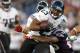 FOXBORO, MA - AUGUST 11: Rashad Jennings #23 of the Jacksonville Jaguars is hit by Pat Chung #25 of the New England Patriots on August 11, 2011 at Gillette Stadium in Foxboro, Massachusetts. (Photo by Elsa/Getty Images)