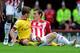 STOKE ON TRENT, ENGLAND - MAY 08: Jack Wilshere of Arsenal and Dean Whitehead of Stoke clash during the Barclays Premier League match between Stoke City and Arsenal at the Britannia Stadium on May 8, 2011 in Stoke on Trent, England. (Photo by Shaun Botterill/Getty Images)