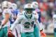 ORCHARD PARK, NY - DECEMBER 18: Vontae Davis #21 of the Miami Dolphins celebrates his interception in the first half against the Buffalo Bills at Ralph Wilson Stadium on December 18, 2011 in Orchard Park, New York. (Photo by Rick Stewart/Getty Images)