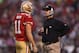 SAN FRANCISCO, CA - JANUARY 22: (L-R) Alex Smith #11 and head coach Jim Harbaugh of the San Francisco 49ers talk during a timeout against the New York Giants in the second quarter during the NFC Championship Game at Candlestick Park on January 22, 2012 in San Francisco, California. (Photo by Ezra Shaw/Getty Images)