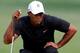 FARMINGDALE, NY - AUGUST 23: Tiger Woods lines up a putt on the 16th green during the First Round of The Barclays on the Black Course at Bethpage State Park August 23, 2012 in Farmingdale, New York. (Photo by Kevin C. Cox/Getty Images)