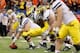 NEW ORLEANS, LA - JANUARY 03: Offensive center David Molk #50 of the Michigan Wolverines readies for the snap at the line of scrimmage against the Virginia Tech Hokies during the Allstate Sugar Bowl at Mercedes-Benz Superdome on January 3, 2012 in New Orleans, Louisiana. (Photo by Kevin C. Cox/Getty Images)
