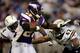 MINNEAPOLIS, MN - NOVEMBER 04: Adrian Peterson #28 of the Minnesota Vikings rushes as Clinton Hart #42 of the San Diego Chargers defends at the Hubert H. Humphrey Metrodome on November 4, 2007 in Minneapolis, Minnesota. (Photo by Doug Pensinger/Getty Images)