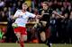 STEVENAGE, ENGLAND - FEBRUARY 19: Michael Dawson of Tottenham (R) clears the ball from Ben May of Stevenage during the FA Cup Fifth Round match between Stevenage and Tottenham Hotspur at The Lamex Stadium on February 19, 2012 in Stevenage, England. (Photo by Scott Heavey/Getty Images)