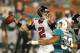 MIAMI GARDENS, FL - AUGUST 24: Matt Ryan #2 of the Atlanta Falcons throws the ball while being pressured by Jared Odrick #98 of the Miami Dolphins during a preseason game on August 24, 2012 at Sun Life Stadium in Miami Gardens, Florida. (Photo by Joel Auerbach/Getty Images)