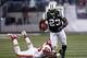 EAST RUTHERFORD, NJ - DECEMBER 11: Shonn Greene #23 of the New York Jets runs away from Justin Houston #50 of the Kansas City Chiefs during their game at MetLife Stadium on December 11, 2011 in East Rutherford, New Jersey. (Photo by Jeff Zelevansky/Getty Images)