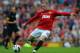 MANCHESTER, ENGLAND - AUGUST 25: Wayne Rooney of Manchester United in action during the Barclays Premier League match between Manchester United and Fulham at Old Trafford on August 25, 2012 in Manchester, England. (Photo by Shaun Botterill/Getty Images)