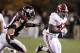 STARKVILLE, MS - NOVEMBER 12: Running back Eddie Lacy #42 of the Alabama Crimson Tide gets around linebacker Cameron Lawrence #10 of the Mississippi State Bulldogs and runs for a touchdown in the fourth quarter as Alabama goes on to win 24-7 on November 12, 2011 at Davis Wade Stadium in Starkville, Mississippi. Alabama won 24-7. (Photo by Butch Dill/Getty Images)