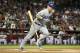 PHOENIX, AZ - SEPTEMBER 26: Jerry Sands #47 of the Los Angeles Dodgers flips the bat after drawing a first inning walk against the Arizona Diamondbacks during the Major League Baseball game at Chase Field on September 26, 2011 in Phoenix, Arizona. The Dodgers defeated the Diamondbacks 4-2. (Photo by Christian Petersen/Getty Images)