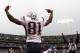 OAKLAND, CA - DECEMBER 14: Randy Moss #81 of the New England Patriots celeberates after scoring a touchdwon against the Oakland Raiders during an NFL game on December 14, 2008 at the Oakland-Alameda County Coliseum in Oakland, California. (Photo by Jed Jacobsohn/Getty Images)
