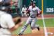CLEVELAND, OH - AUGUST 12: Carl Crawford #13 rounds third base on his way home off a double by Dustin Pedroia #15 of the Boston Red Sox during the first inning at Progressive Field on August 12, 2012 in Cleveland, Ohio. (Photo by Jason Miller/Getty Images)