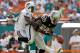 MIAMI GARDENS, FL - DECEMBER 04: Darrius Heyward-Bey #85 of the Oakland Raiders fights for a loose ball with Vontae Davis #21 of the Miami Dolphins during a game at Sun Life Stadium on December 4, 2011 in Miami Gardens, Florida. (Photo by Mike Ehrmann/Getty Images)