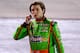 Aug 25, 2012; Bristol, TN, USA; NASCAR Sprint Cup Series driver Danica Patrick (10) gets out of her car after crashing during the IRWIN Tools Night Race a Bristol Motor Speedway. Mandatory Credit: Andrew Weber-US Presswire