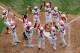 SOUTH WILLAMSPORT, PA - AUGUST 25: Noriatsu Osaka #10 (L) of team Japan celebrates after hitting a three run home run against team Panama during the fourth inning of their Little League World Series on August 25, 2012 in South Willamsport, Pennsylvania. (Photo by Rob Carr/Getty Images)