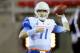 LAS VEGAS, NV - NOVEMBER 05: Quarterback Kellen Moore #11 of the Boise State Broncos warms up before a game against the UNLV Rebels at Sam Boyd Stadium November 5, 2011 in Las Vegas, Nevada. The Broncos won 48-21 giving Moore his 46th victory and making him the winningest quarterback in NCAA history. (Photo by Ethan Miller/Getty Images)