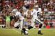 GLENDALE, AZ - AUGUST 17: quarterback Terrelle Pryor #6 of the Oakland Raiders hands off the football to running back Lonyae Miller #46 during the NFL preseason game against the Arizona Cardinals at the University of Phoenix Stadium on August 17, 2012 in Glendale, Arizona. (Photo by Christian Petersen/Getty Images)