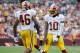 LANDOVER, MD - AUGUST 25: Alfred Morris #46 celebrates with Robert Griffin III #10 of the Washington Redskins after scoring a touchdown against the Indianapolis Colts during a preseason game at FedExField on August 25, 2012 in Landover, Maryland. (Photo by Patrick McDermott/Getty Images)