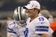 Aug 25, 2012; Arlington, TX, USA; Dallas Cowboys quarterback Tony Romo (9) smiles on the sidelines in the first half against the St Louis Rams at Cowboys Stadium. Mandatory Credit: Matthew Emmons-US PRESSWIRE